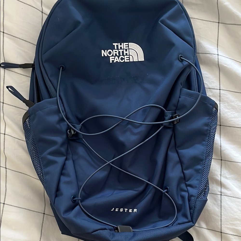 The North Face Blue Backpack with Bungee Cord System
